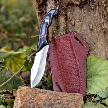 Handcrafted Skinner Knife – Black Handle & Tooled Leather Sheath